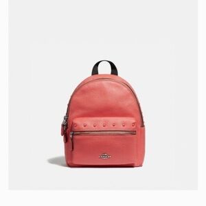 Coach Coral Pink Pebbled Leather Mini Backpack with Black Straps